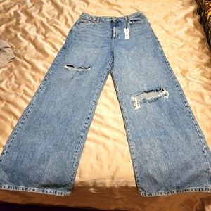 High waisted, wide leg ripped jeans.